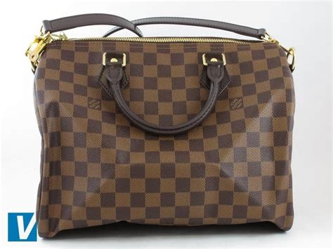 louis vuitton tivoli fake|false Louis Vuitton prints.